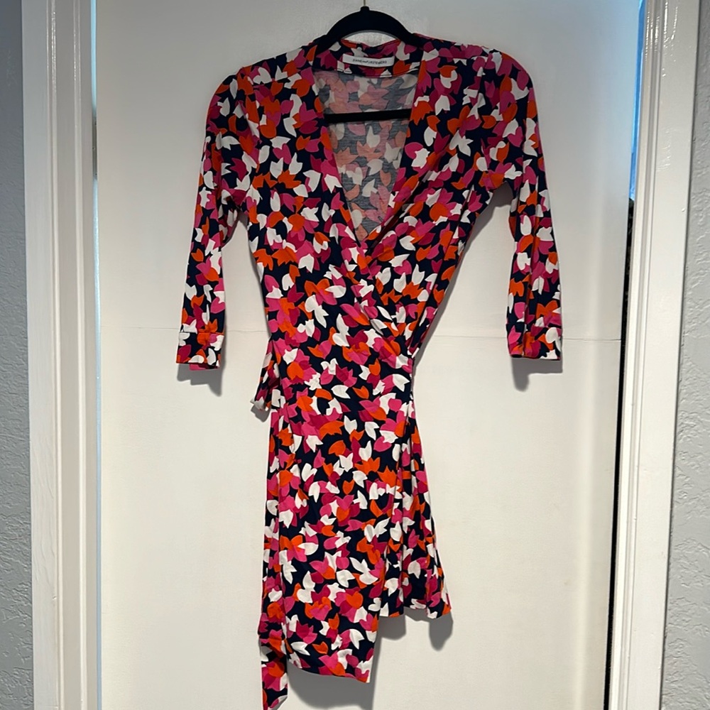 DVF wrap dress. Great condition. Pink, white, orange and navy pattern.